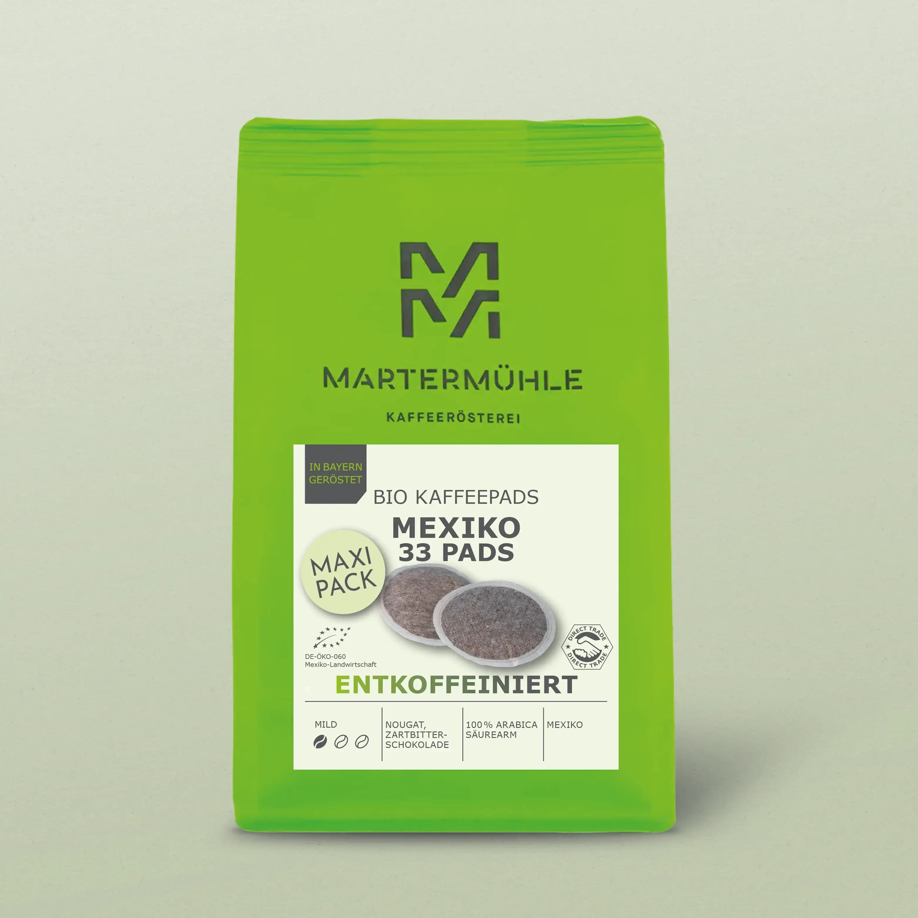 Kaffeepads Bio Kaffee Mexiko entkoffeiniert Packung vor hellgrünem Hintergrund.